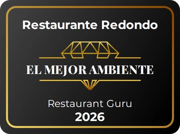 Sello de Restaurant Guru 2026: Restaurante Redondo, el mejor ambiente